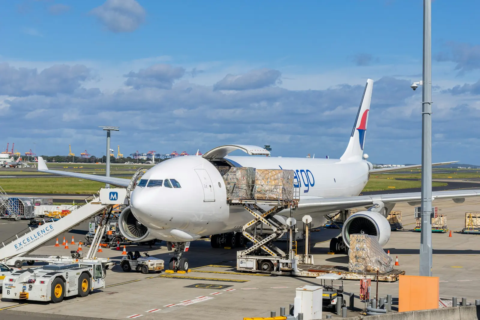 Air cargo being loaded onto an aircraft on the apron